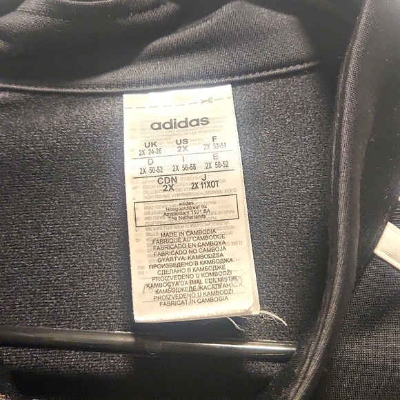 Woman's adidas Essentials Warm-Up 3 Stripes Track Jacket - Picture 3 of 4